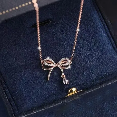 Designs & You AD Studded Infinity Shape Korean Pendant (Rose Gold)